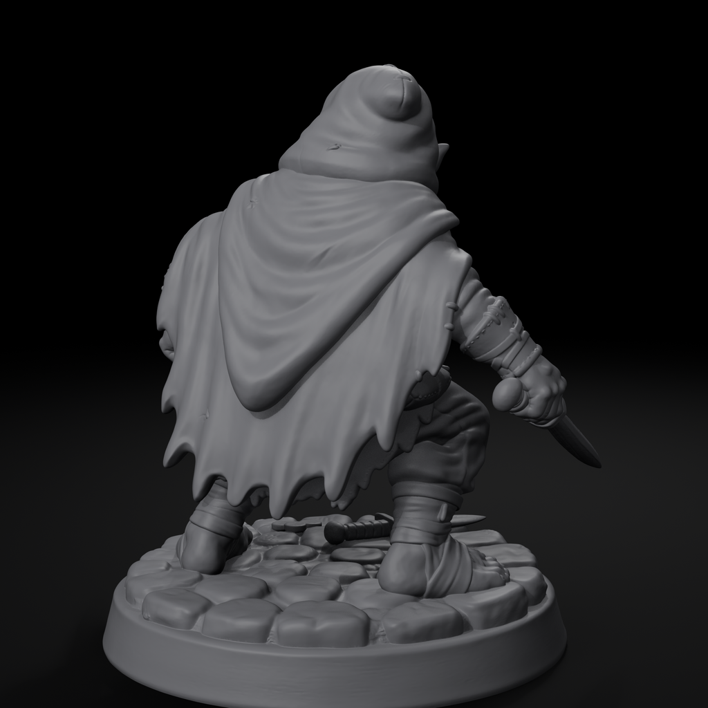 Halfling rogue D&D miniature, back view, unpainted resin